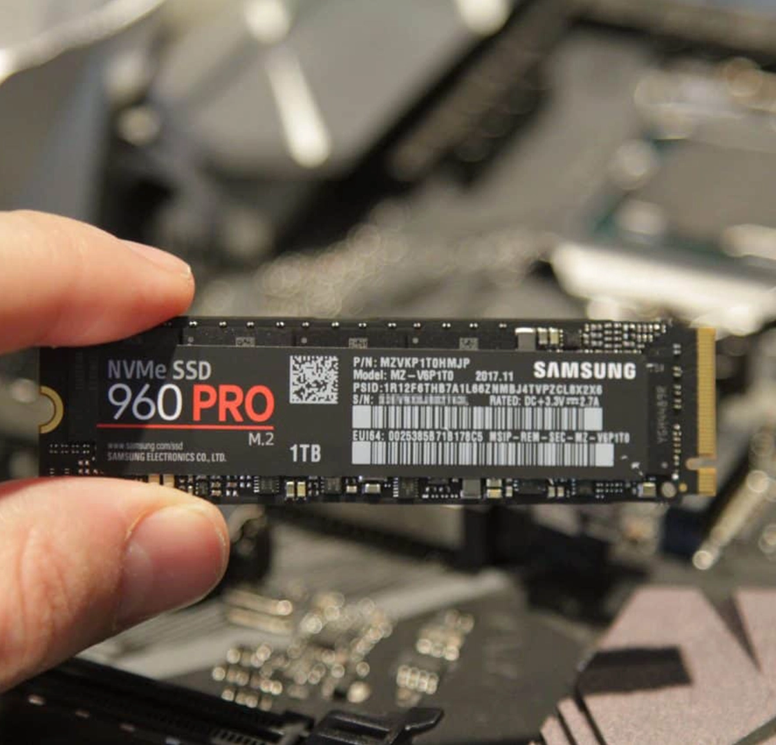 Data Recovery Service from Broken NVMe M2 SSD in Sakarya Samsung NVMe M2 Veri Kurtarma a hand holding a black and white rectangular object Samsung NVMe M2 Veri Kurtarma